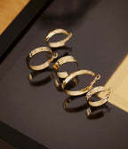 Boucles d'oreilles Etro (Acier doré)